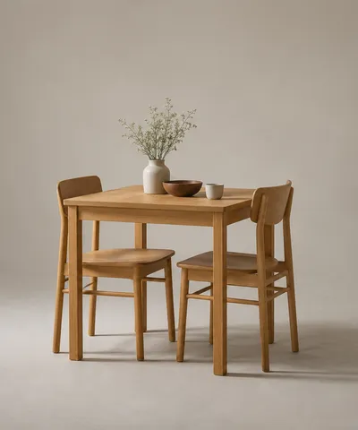 Oak dining table with two oak chairs