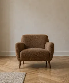 Armchair in brown boucle fabric